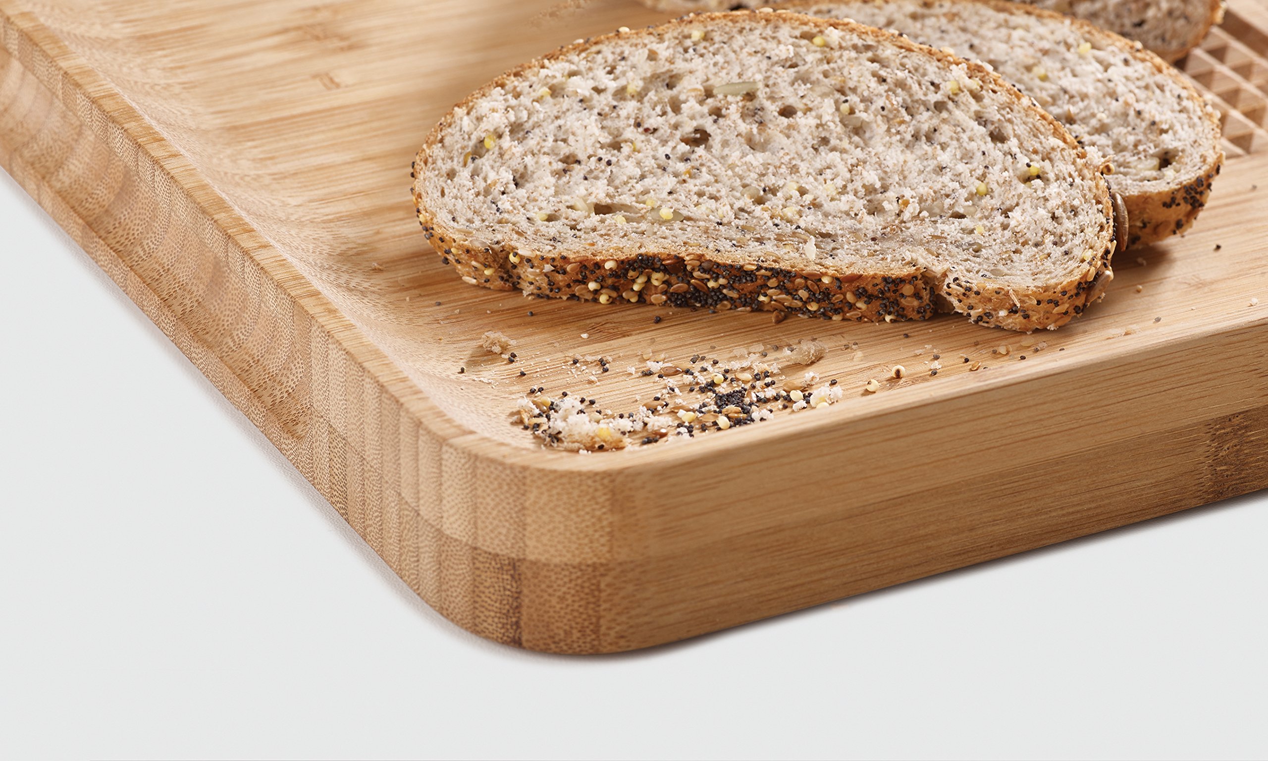 joseph-joseph-cut-carve-plus-planche-d-couper-en-bambou-naturel-avec-grip-centra image 3